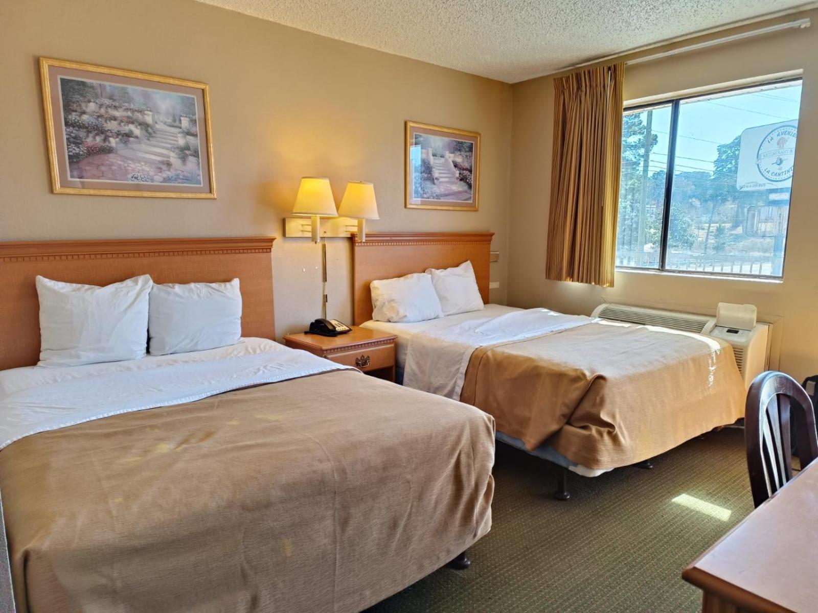 Executive Inn By Oyo Kilgore North ภายนอก รูปภาพ